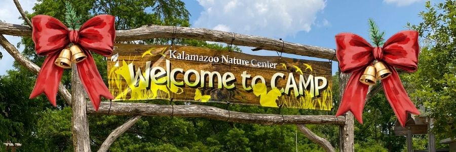 Camp welcome banner on rustic background with holiday bows