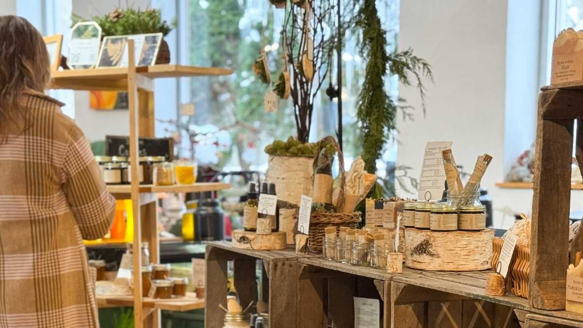 Person shopping at holiday art fair