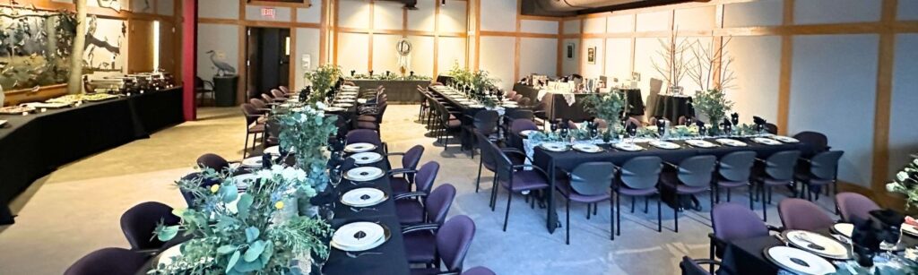 wedding venue with greenery and dinner